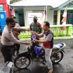 Sinergitas TNI/Polri, Bagikan Masker Gratis Kepada Pengendara Motor Di Depan Perkantoran.